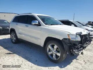 2012 Jeep Grand Cherokee Overland with VIN 1C4RJFCT9CC346757, listed as a Copart auction lot 47946815 with 71,316 mi miles and Salvage Title. Bid and sale history available at carsss.com. Image 4.