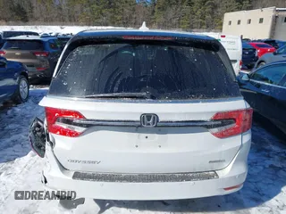 2023 Honda Odyssey Touring with VIN 5FNRL6H81PB008129, listed as a IAAI auction lot 41610714 with 57,273 mi miles and . Bid and sale history available at DreamBid. Image 16.
