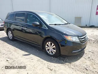 2014 Honda Odyssey EX-L with VIN 5FNRL5H66EB062158, listed as a IAAI auction lot 42072020 with 211,278 mi miles and . Bid and sale history available at carsss.com. Image 1.