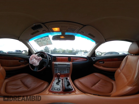 2003 Lexus SC with VIN JTHFN48Y430043403, listed as a IAAI auction lot 42057878 with 69,691 mi miles. Bid and sale history available at carsss.com. Image 19.
