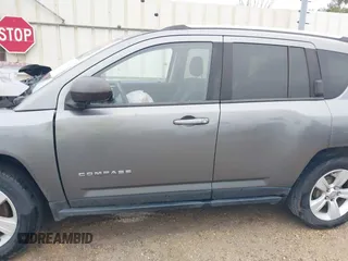 2012 Jeep Compass Sport with VIN 1C4NJCBB7CD664599, listed as a IAAI auction lot 41180829 with 144,909 mi miles. Bid and sale history available at carsss.com. Image 14.