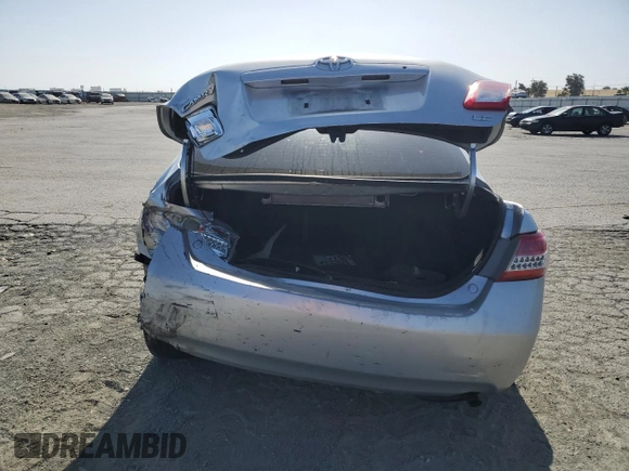 2010 Toyota Camry z VIN 4T1BF3EK0AU006776, wystawiony jako Copart lot #58246615 z przebiegiem 222 002 mil mil oraz Szkoda całkowita • Salvage title. Historia ofert i sprzedaży dostępna na DreamBid. Obrazek 6.