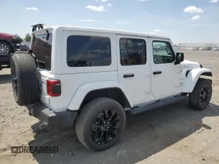 2024 Jeep Wrangler Sahara с VIN 1C4RJXP62RW275130, выставлен на аукционе Copart как лот 62665895 с пробегом 21 521 миль миль и На запчасти • Non repairable. История ставок и продаж доступна на DreamBid. Изображение 3.