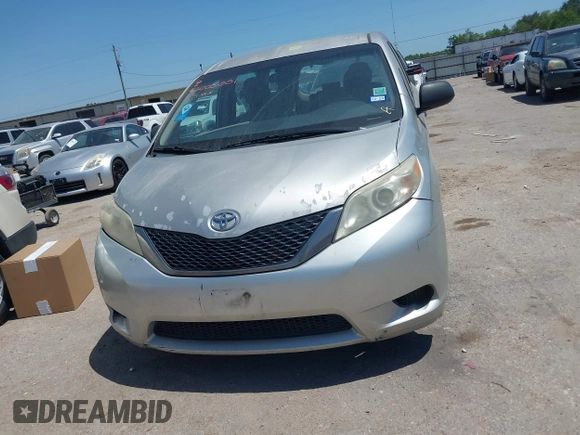 2014 Toyota Sienna L with VIN 5TDZK3DC1ES410012, listed as a IAAI auction lot 42005001 with 440,789 mi miles. Bid and sale history available at carsss.com. Image 12.