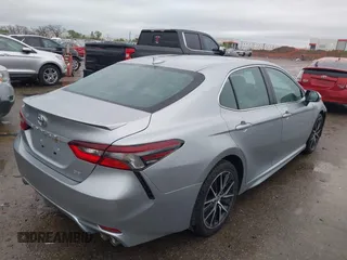 2022 Toyota Camry SE with VIN 4T1G11AKXNU697576, listed as a IAAI auction lot 41947082 with 67,199 mi miles and . Bid and sale history available at DreamBid. Image 4.