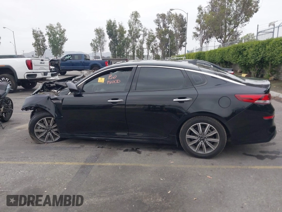 2019 Kia Optima EX with VIN 5XXGU4L14KG290842, listed as a IAAI auction lot 42030617 with Not Provided miles and . Bid and sale history available at carsss.com. Image 15.