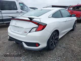 2018 Honda Civic Si z VIN 2HGFC3A52JH751998, wystawiony jako IAAI lot #42415499 z przebiegiem 58 088 mil mil oraz . Historia ofert i sprzedaży dostępna na DreamBid. Obrazek 4.