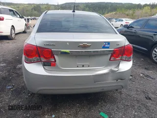 2014 Chevrolet Cruze 1LT with VIN 1G1PC5SB5E7403383, listed as a IAAI auction lot 41960344 with 141,586 mi miles and . Bid and sale history available at DreamBid. Image 12.