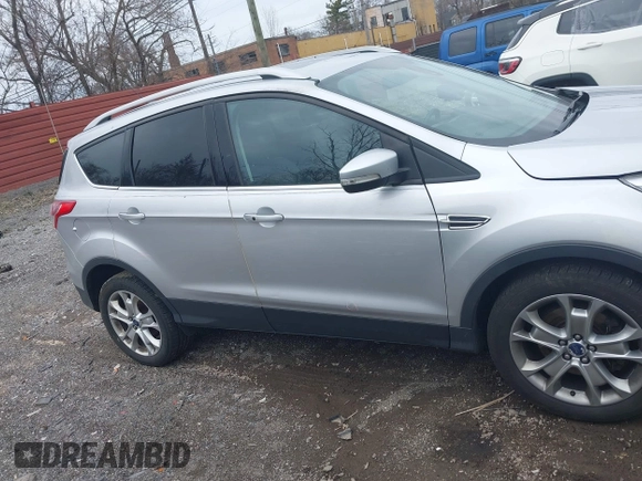 2016 Ford Escape Titanium with VIN 1FMCU9J93GUC55811, listed as a IAAI auction lot 41961519 with 99,878 mi miles. Bid and sale history available at carsss.com. Image 13.
