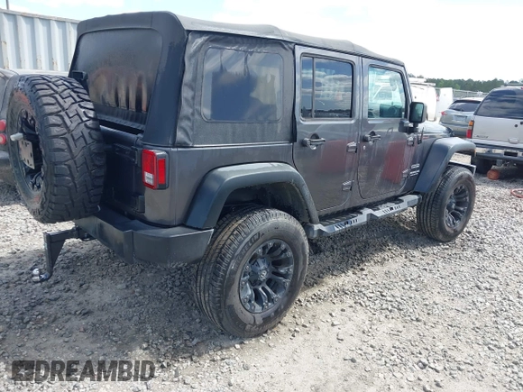 2017 Jeep Wrangler Unlimited Sport with VIN 1C4BJWDG6HL517779, listed as a IAAI auction lot 42134534 with 128,701 mi miles and . Bid and sale history available at DreamBid. Image 4.