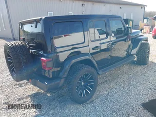 2021 Jeep Wrangler Unlimited Sahara with VIN 1C4HJXEG4MW650547, listed as a IAAI auction lot 42052146 with 26,983 mi miles and . Bid and sale history available at DreamBid. Image 4.