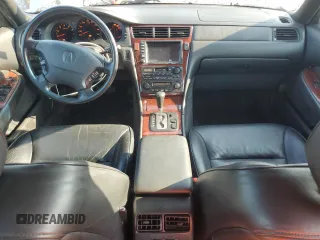 2002 Acura RL with VIN JH4KA96662C014359, listed as a Copart auction lot 55656515 with 107,884 mi miles and Salvage title. Bid and sale history available at DreamBid. Image 8.