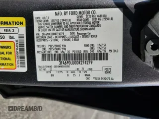 2013 Ford Fusion SE Hybrid z VIN 3FA6P0LU0DR274279, wystawiony jako Copart lot #57462315 z przebiegiem 272 825 mil mil oraz Szkoda całkowita • Salvage title. Historia ofert i sprzedaży dostępna na DreamBid. Obrazek 12.