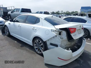 2015 Kia Optima SX with VIN 5XXGR4A73FG372592, listed as a IAAI auction lot 42575509 with 148,043 mi miles and . Bid and sale history available at DreamBid. Image 3.