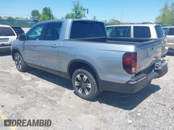 2020 Honda Ridgeline RTL with VIN 5FPYK3F5XLB019296, listed as a IAAI auction lot 42204290 with 48,197 mi miles and . Bid and sale history available at DreamBid. Image 3.