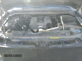 2006 Nissan Titan LE z VIN 1N6AA07B86N516155, wystawiony jako Copart lot #49080025 z przebiegiem 152 345 mil mil oraz Szkoda całkowita • Salvage title. Historia ofert i sprzedaży dostępna na DreamBid. Obrazek 12.