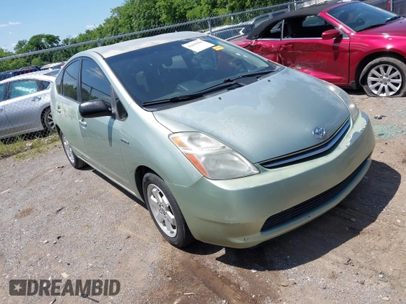 2007 Toyota Prius z VIN JTDKB20UX77647346, wystawiony jako IAAI lot #42339384 z przebiegiem 168 836 mil mil oraz . Historia ofert i sprzedaży dostępna na DreamBid. Obrazek 1.