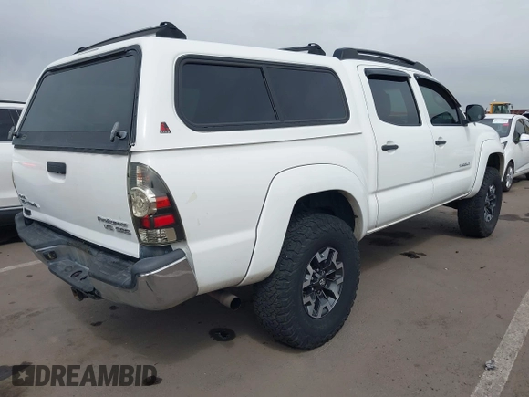 2009 Toyota Tacoma PreRunner with VIN 3TMJU62N49M076433, listed as a IAAI auction lot 41902369 with 164,827 mi miles. Bid and sale history available at carsss.com. Image 4.