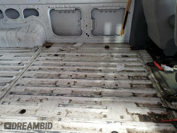 2018 Nissan NV Cargo S z VIN 1N6BF0LY5JN810069, wystawiony jako Copart lot #43775445 z przebiegiem 257 977 mil mil oraz Szkoda całkowita • Salvage title. Historia ofert i sprzedaży dostępna na DreamBid. Obrazek 11.