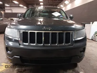 2011 Jeep Grand Cherokee 70th Anniversary with VIN 1J4RR4GG3BC566690, listed as a IAAI auction lot 41810545 with 173,886 mi miles. Bid and sale history available at carsss.com. Image 6.