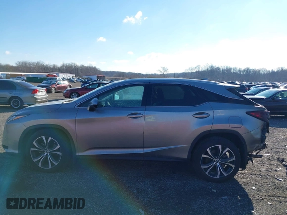 2018 Lexus RX 350 z VIN 2T2BZMCA2JC151645, wystawiony jako IAAI lot #41683204 z przebiegiem 41 838 mil mil oraz . Historia ofert i sprzedaży dostępna na DreamBid. Obrazek 14.