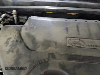 2018 Land Rover Discovery z VIN SALCT2RX5JH737738, wystawiony jako Copart lot #88495735 z przebiegiem 59 191 mil mil oraz Szkoda całkowita • Salvage title. Historia ofert i sprzedaży dostępna na DreamBid. Obrazek 14.