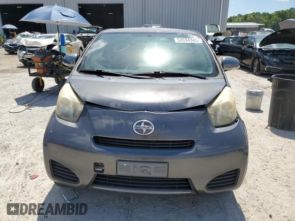 2012 Scion iQ with VIN JTNJJXB06CJ011117, listed as a Copart auction lot 52694345 with 94,547 mi miles and Salvage Title. Bid and sale history available at carsss.com. Image 5.