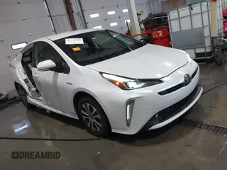 2021 Toyota Prius LE with VIN JTDL9MFU9M3025214, listed as a IAAI auction lot 41375860 with 76,259 mi miles and . Bid and sale history available at DreamBid. Image 1.