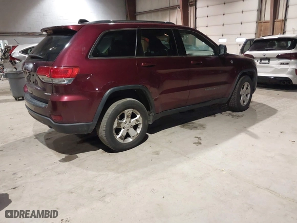 2018 Jeep Grand Cherokee Laredo E with VIN 1C4RJFAG9JC359284, listed as a IAAI auction lot 41032232 with 163,679 mi miles. Bid and sale history available at carsss.com. Image 4.