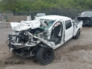 2013 Toyota Tacoma z VIN 5TFMU4FN9DX019465, wystawiony jako IAAI lot #42010194 z przebiegiem 115 812 mil mil oraz . Historia ofert i sprzedaży dostępna na DreamBid. Obrazek 6.