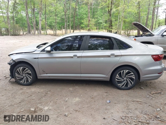 2020 Volkswagen Jetta SEL z VIN 3VWE57BU9LM082552, wystawiony jako IAAI lot #42091492 z przebiegiem 60 775 mil mil oraz . Historia ofert i sprzedaży dostępna na DreamBid. Obrazek 14.