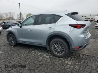 2017 Mazda CX-5 Touring with VIN JM3KFACL9H0183937, listed as a Copart auction lot 48861865 with 91,268 mi miles and Salvage Title. Bid and sale history available at carsss.com. Image 2.