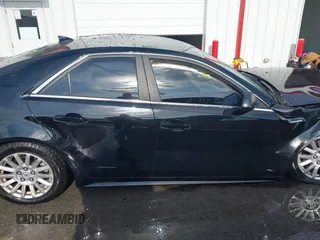2011 Cadillac CTS with VIN 1G6DC5EY7B0118590, listed as a IAAI auction lot 41003246 with Not provided miles and . Bid and sale history available at DreamBid. Image 14.