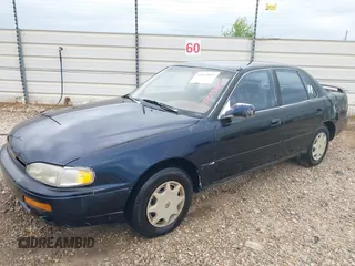 1996 Toyota Camry DX with VIN 4T1BG12K6TU754392, listed as a IAAI auction lot 42013697 with 172,410 mi miles. Bid and sale history available at carsss.com. Image 2.