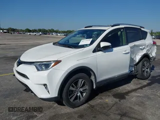 2018 Toyota RAV4 XLE with VIN JTMWFREV3JJ753454, listed as a IAAI auction lot 41775159 with 75,078 mi miles. Bid and sale history available at carsss.com. Image 2.