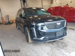 2022 Cadillac XT6 Premium Luxury z VIN 1GYKPDRS0NZ131233, wystawiony jako IAAI lot #41600244 z przebiegiem 112 258 mil mil oraz . Historia ofert i sprzedaży dostępna na DreamBid. Obrazek 1.