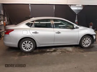 2018 Nissan Sentra S with VIN 3N1AB7AP0JY227296, listed as a IAAI auction lot 41950972 with 57,984 mi miles and . Bid and sale history available at DreamBid. Image 14.