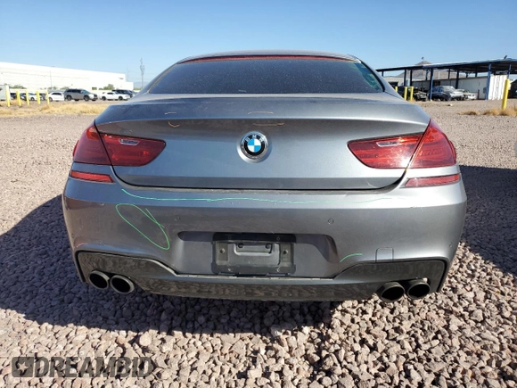 2014 BMW 6 Series 650i z VIN WBA6B2C57ED129034, wystawiony jako Copart lot #72774814 z przebiegiem 116 835 mil mil oraz Szkoda całkowita • Salvage title. Historia ofert i sprzedaży dostępna na DreamBid. Obrazek 6.