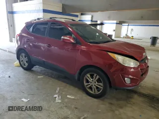 2013 Hyundai Tucson GLS with VIN KM8JU3AC7DU614962, listed as a Copart auction lot 51957675 with 112,942 mi miles and Salvage Title. Bid and sale history available at carsss.com. Image 4.