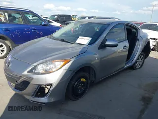 2010 Mazda 3 i SV with VIN JM1BL1SF4A1148543, listed as a IAAI auction lot 40110323 with 131,801 mi miles and . Bid and sale history available at DreamBid. Image 2.