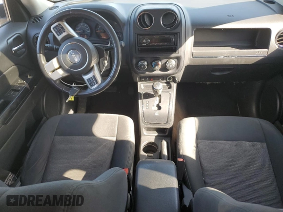 2014 Jeep Patriot Latitude with VIN 1C4NJRFB5ED855888, listed as a Copart auction lot 57969355 with 113,196 mi miles and Salvage title. Bid and sale history available at DreamBid. Image 8.