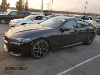 2023 BMW 8 Series 840i with VIN WBAGV2C01PCK95705, listed as a Copart auction lot 83424634 with 23,674 mi miles and Salvage Title. Bid and sale history available at carsss.com. Image 1.