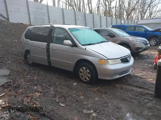 2002 Honda Odyssey EX-L z VIN 5FNRL18012B045297, wystawiony jako IAAI lot #41661929 z przebiegiem 250 399 mil mil oraz . Historia ofert i sprzedaży dostępna na DreamBid. Obrazek 1.