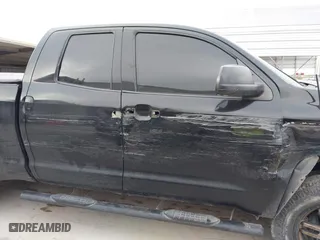 2014 Toyota Tundra 4WD Truck SR with VIN 5TFUM5F14EX051843, listed as a IAAI auction lot 41773983 with 145,089 mi miles. Bid and sale history available at carsss.com. Image 13.