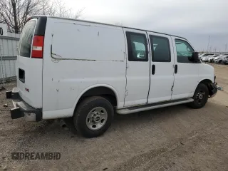 2014 GMC Savana Cargo Van with VIN 1GTW7FCAXE1909748, listed as a Copart auction lot 87214754 with 263,944 mi miles and Salvage Title. Bid and sale history available at carsss.com. Image 3.