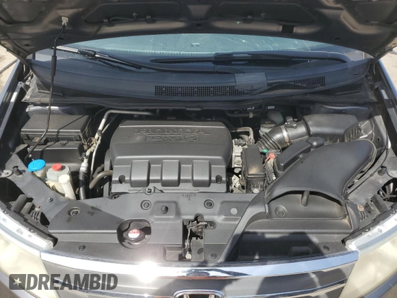 2012 Honda Odyssey EX-L with VIN 5FNRL5H61CB067331, listed as a Copart auction lot 50016455 with 156,020 mi miles and Non Repairable. Bid and sale history available at DreamBid. Image 12.