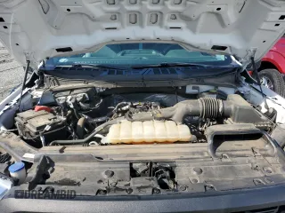 2021 Ford F-150 XL with VIN 1FTMF1CP5MKE21303, listed as a Copart auction lot 56406605 with 93,906 mi miles and Salvage title. Bid and sale history available at DreamBid. Image 11.