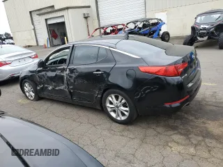 2011 Kia Optima EX with VIN KNAGN4A66B5085486, listed as a Copart auction lot 76928424 with 153,610 mi miles and Salvage Title. Bid and sale history available at carsss.com. Image 2.