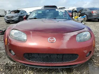 2006 Mazda MX-5 Miata Touring z VIN JM1NC25F260121773, wystawiony jako Copart lot #55887175 z przebiegiem Nie podano mil oraz Szkoda całkowita • Salvage title. Historia ofert i sprzedaży dostępna na DreamBid. Obrazek 5.