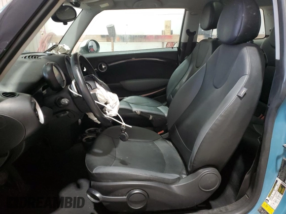 2009 MINI Hardtop with VIN WMWMF33569TW74610, listed as a Copart auction lot 54889805 with 147,533 mi miles and Salvage Title. Bid and sale history available at DreamBid. Image 7.
